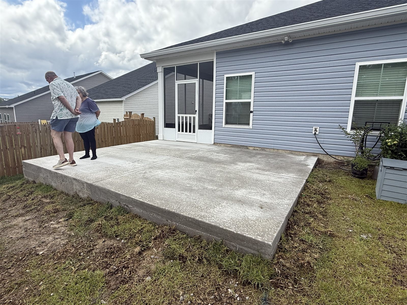 Elevated backyard patio slab off a screened porch, Columbia SC