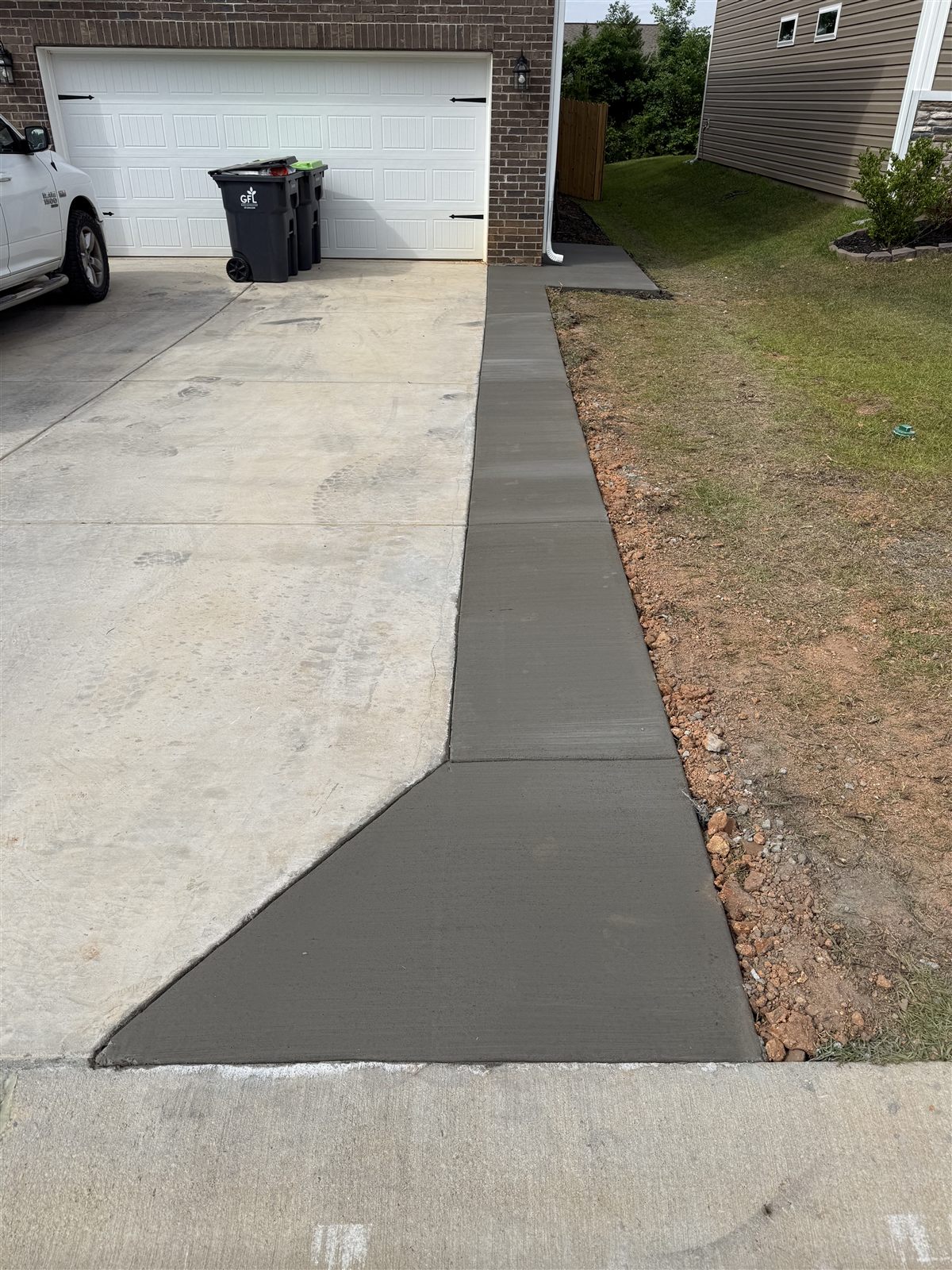 Concrete walkway running alongside a driveway, Columbia SC